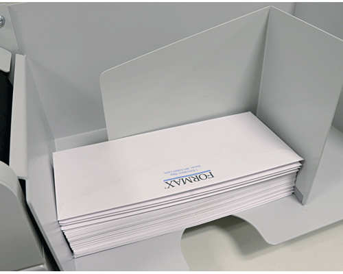 Large outfeed tray handles envelopes up to 9.75" W x 15" L